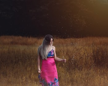 Photo of Woman On Grass Field