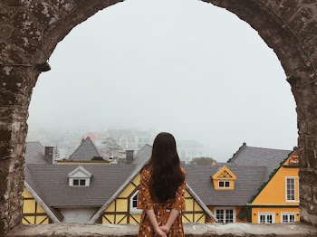 Photo Of Woman On Wearing Brown Floral Dress