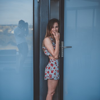 Photo of Woman Opening Door