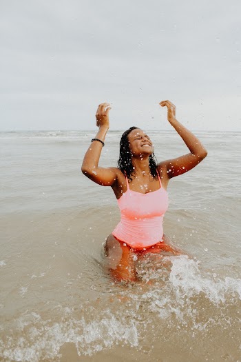Photo Of Woman Playing With Water