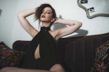 Photo of Woman Posing on Couch