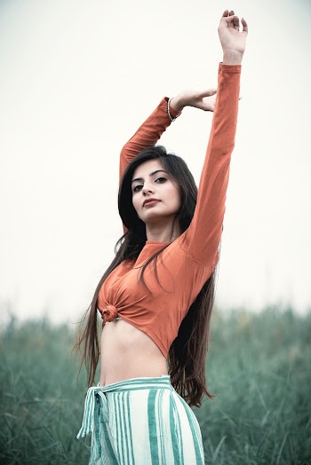 Photo Of Woman Raising Her Arms