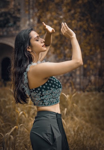Photo of Woman Raising Her Both Hands