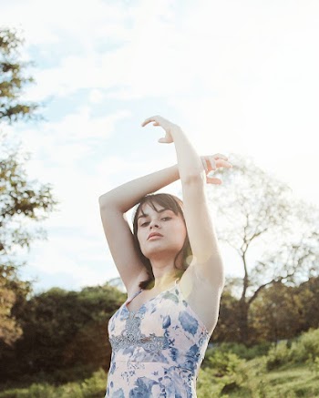 Photo Of Woman Raising Her Hands