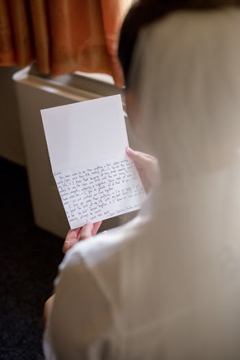 Photo of Woman Reading a Letter