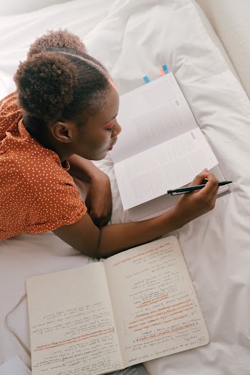 Photo Of Woman Reading Book