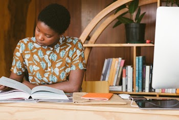 Photo Of Woman Reading Books