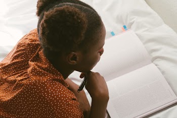 Photo Of Woman Reading Books