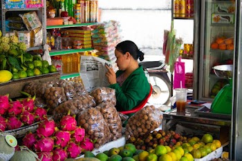 Photo of Woman Reading Newspaper