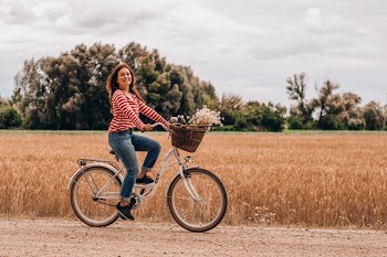 Photo Of Woman Riding Bicycle