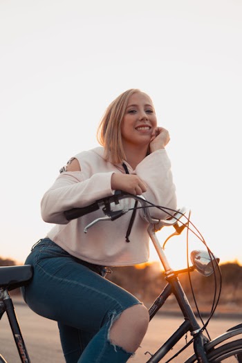 Photo of Woman Riding Bicycle