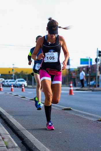 Photo of Woman Running on Road