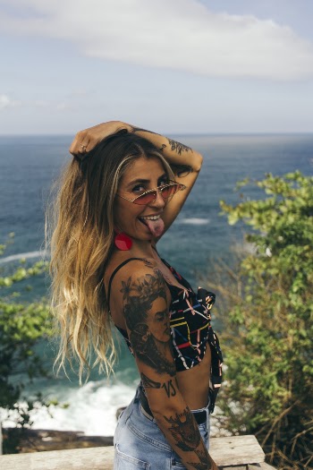 Photo Of Woman Showing Her Tongue