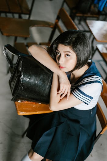 Photo Of Woman Siting On Chair