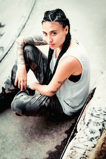 Photo of Woman Sitting and Looking