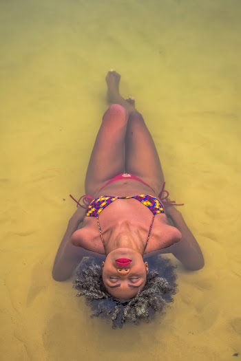 Photo Of Woman Sitting In Water