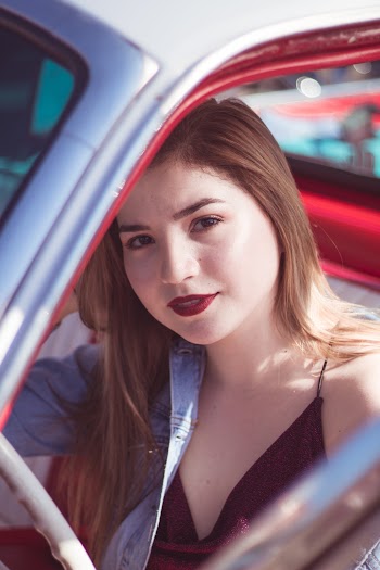 Photo Of Woman Sitting Inside Car