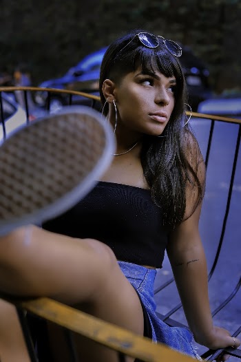 Photo Of Woman Sitting On A Chair