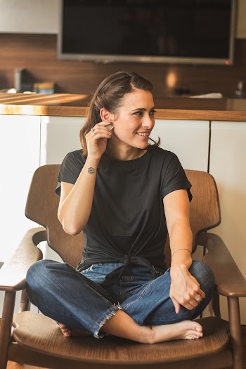 Photo of Woman Sitting On Armchair