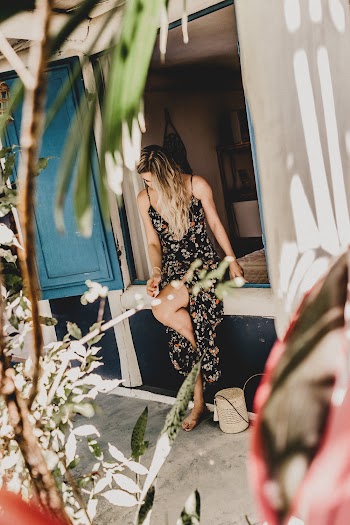 Photo Of Woman Sitting On Cabin Floor