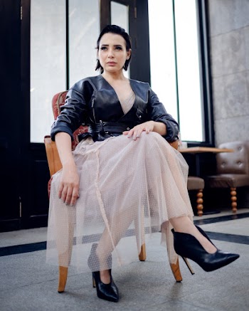 Photo of Woman Sitting On Chair