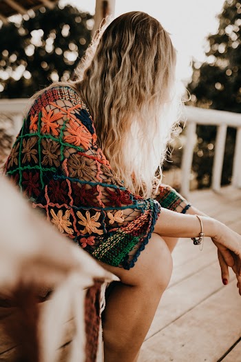 Photo Of Woman Sitting On Chair