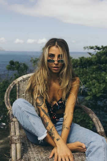 Photo of Woman Sitting On Chair