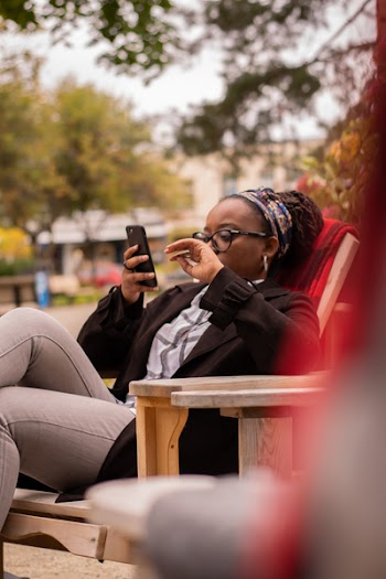 Photo of Woman Sitting On Chair