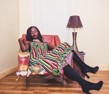 Photo of Woman Sitting On Chair