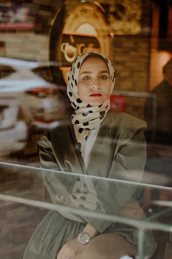 Photo of Woman Sitting on Chair