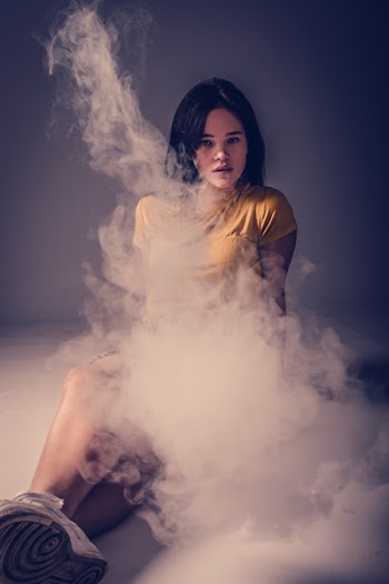 Photo of Woman Sitting on Floor