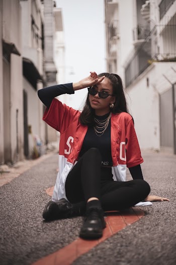 Photo Of Woman Sitting On Ground