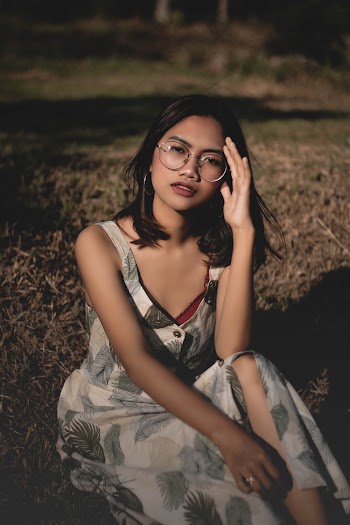 Photo Of Woman Sitting On Ground