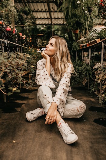 Photo Of Woman Sitting On Ground