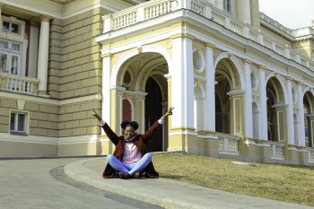 Photo of Woman Sitting on Ground