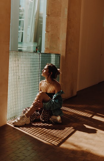 Photo Of Woman Sitting On Ground