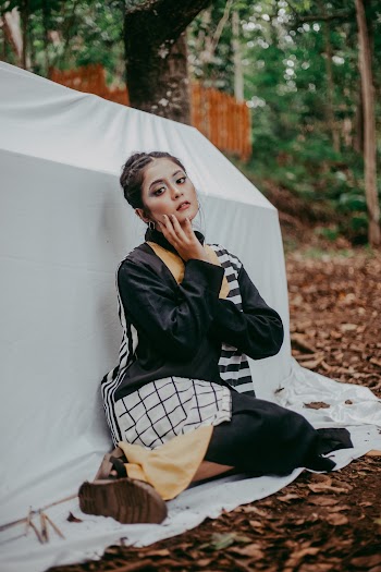 Photo Of Woman Sitting On Ground