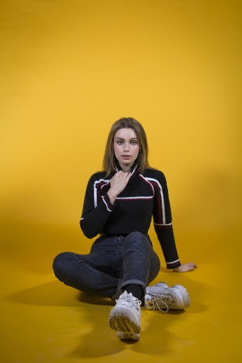 Photo Of Woman Sitting On Ground