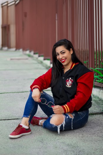 Photo of Woman Sitting On Pavement