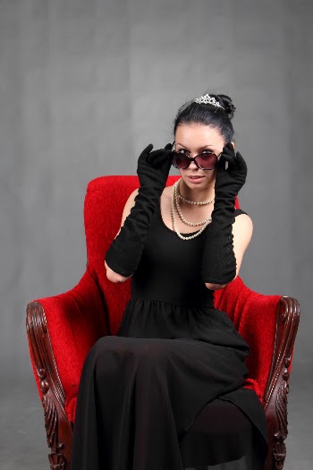 Photo of Woman Sitting On Red Chair
