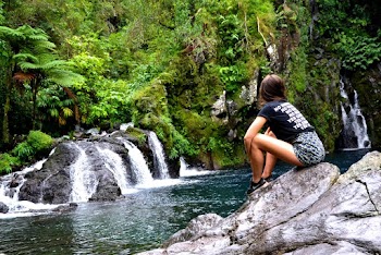 Photo of Woman Sitting On Rock