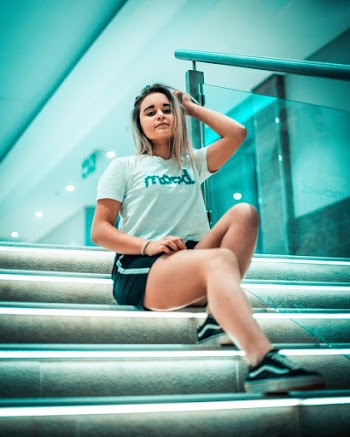 Photo of Woman Sitting On Stairs