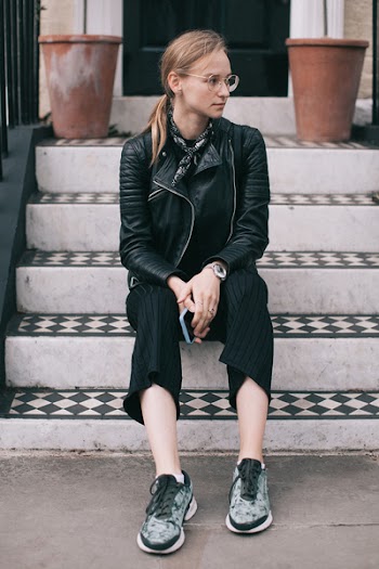 Photo of Woman Sitting On Stairs