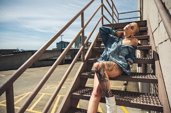 Photo of Woman Sitting on Stairs