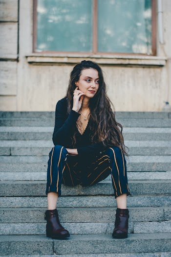 Photo of Woman Sitting on Stairs
