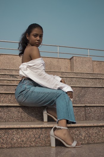 Photo Of Woman Sitting On Stairs