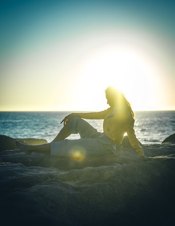 Photo Of Woman Sitting On The Ground