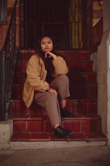 Photo Of Woman Sitting On The Stairs