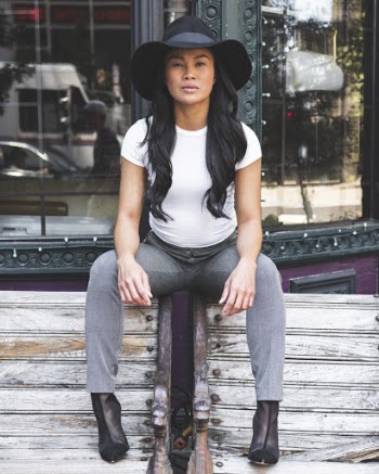 Photo Of Woman Sitting On Top Of Bench