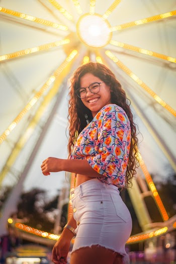Photo of Woman Smiling and Wearing Eyeglasses